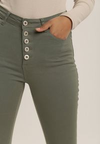 Renee - Ciemnozielone Spodnie Skinny Winvienne. Stan: podwyższony. Kolor: zielony. Długość: długie. Wzór: ażurowy