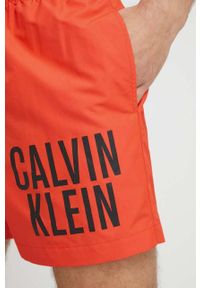 Calvin Klein szorty kąpielowe kolor pomarańczowy. Kolor: pomarańczowy. Materiał: tkanina, poliester, materiał #3