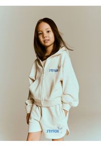 Reserved - Szorty Lilo i Stitch - beżowy. Kolor: beżowy. Materiał: bawełna