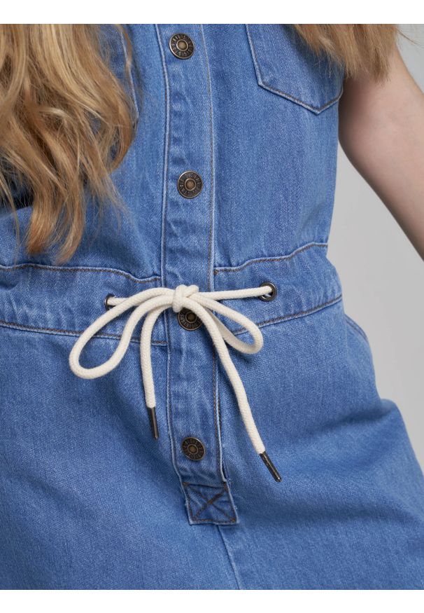 Big-Star - Kombinezon dziewczęcy jeansowy niebieski Quinn 129. Kolor: niebieski. Materiał: jeans. Sezon: lato. Styl: młodzieżowy