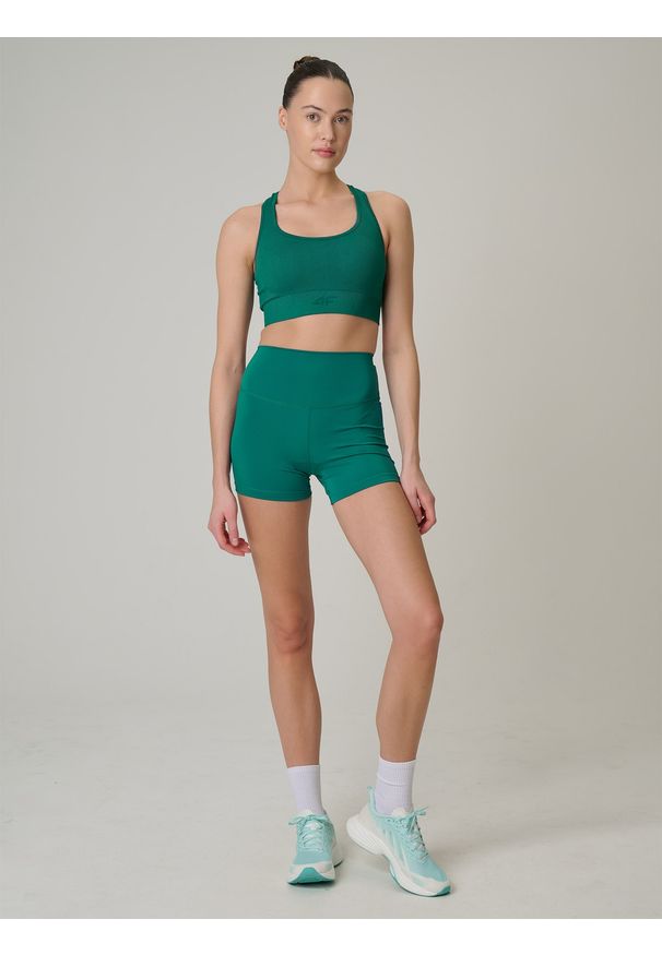 4f - 4F Legginsy krótkie treningowe damskie - turkusowe XS. Stan: podwyższony. Kolor: turkusowy. Materiał: włókno. Długość: krótkie