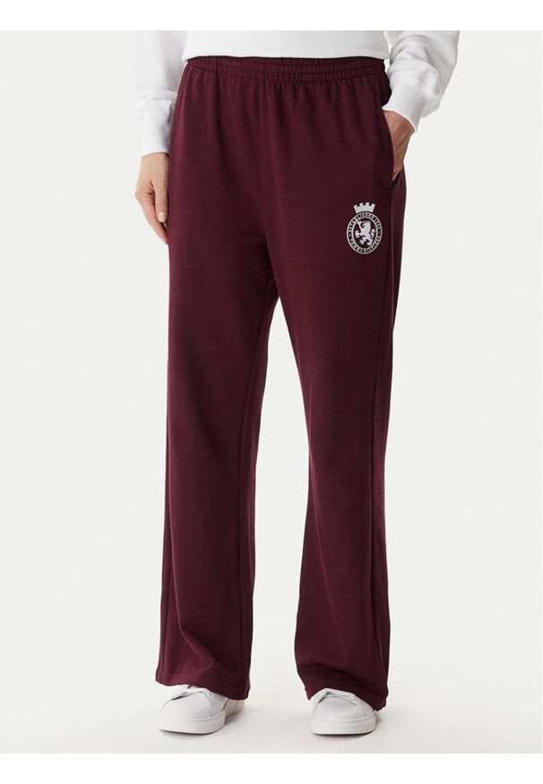 TOMMY HILFIGER - Tommy Hilfiger Spodnie dresowe UW0UW06081 Bordowy Wide Leg. Kolor: czerwony. Materiał: bawełna