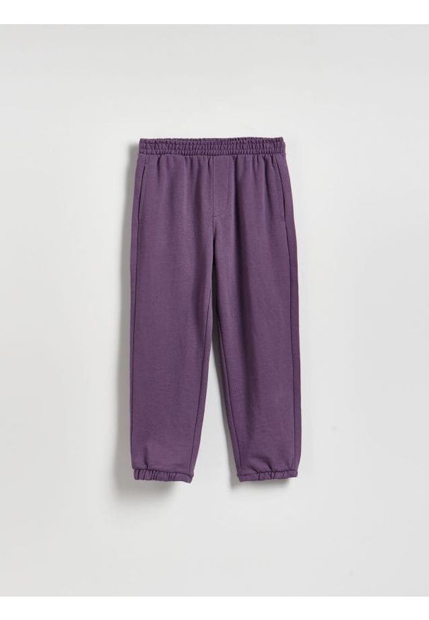 Reserved - Bawełniane spodnie jogger - fioletowy. Kolor: fioletowy. Materiał: bawełna