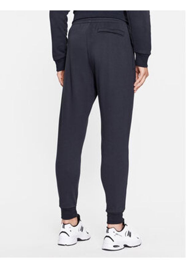 Under Armour Spodnie dresowe Ua Rival Fleece Joggers 1379774 Czarny Loose Fit. Kolor: czarny. Materiał: bawełna