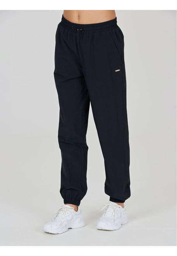 Athlecia Spodnie dresowe Hero W Track Pants EA233336 Czarny Regular Fit. Kolor: czarny. Materiał: syntetyk