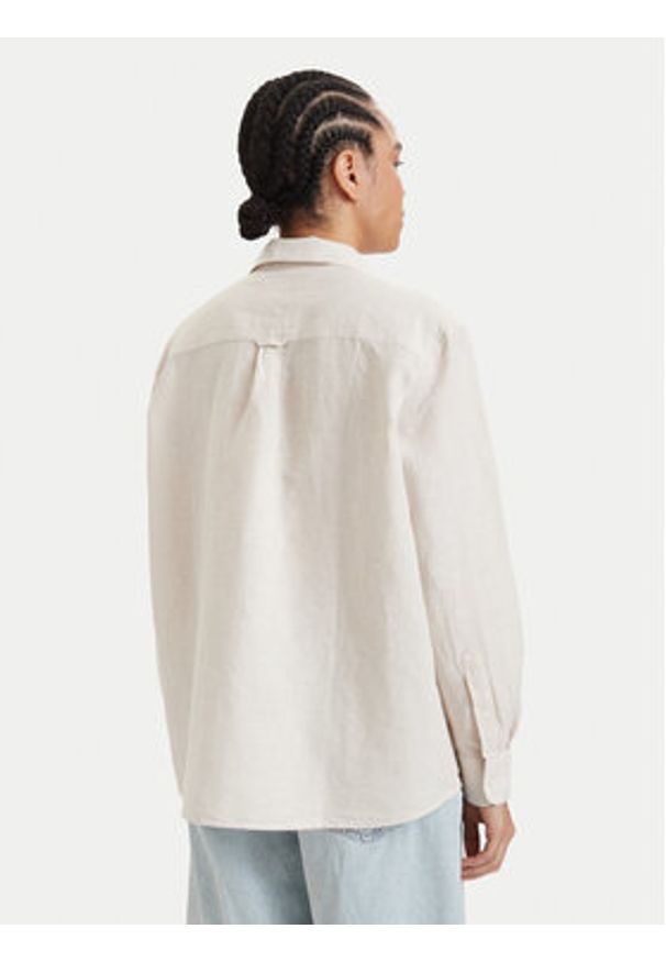 Tommy Jeans Koszula DW0DW22209 Beżowy jasny Relaxed Fit. Kolor: beżowy. Materiał: len
