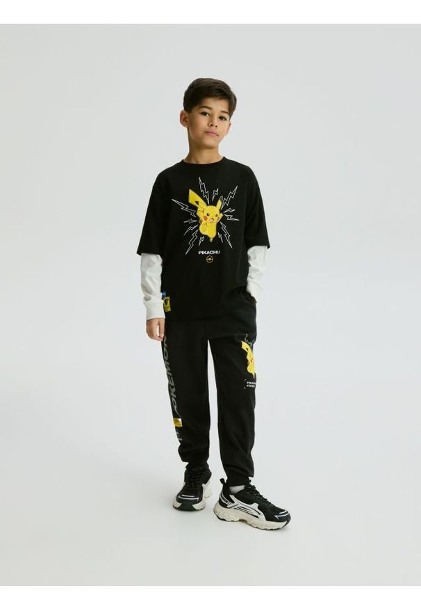 Reserved - Longsleeve Pokémon - czarny. Kolor: czarny. Materiał: dzianina, bawełna. Długość rękawa: długi rękaw