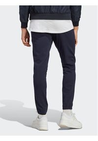 Adidas - adidas Spodnie dresowe Essentials IC0056 Granatowy Regular Fit. Kolor: niebieski. Materiał: bawełna #6