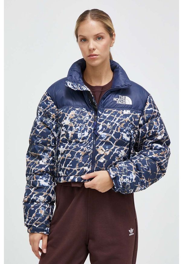 The North Face kurtka puchowa damska kolor granatowy zimowa oversize. Typ kołnierza: kołnierzyk stójkowy. Kolor: niebieski. Materiał: puch. Sezon: zima