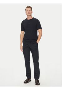 TOMMY HILFIGER - Tommy Hilfiger Chinosy Denton MW0MW38863 Granatowy Slim Fit. Kolor: niebieski. Materiał: bawełna
