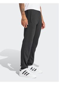 Adidas - adidas Spodnie dresowe Trefoil Essentials IR7798 Czarny Slim Fit. Kolor: czarny. Materiał: bawełna
