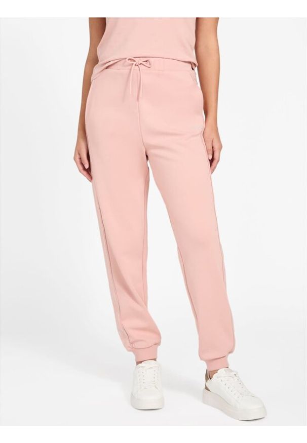 Guess Spodnie materiałowe 179778 Różowy Slim Fit. Kolor: różowy. Materiał: materiał