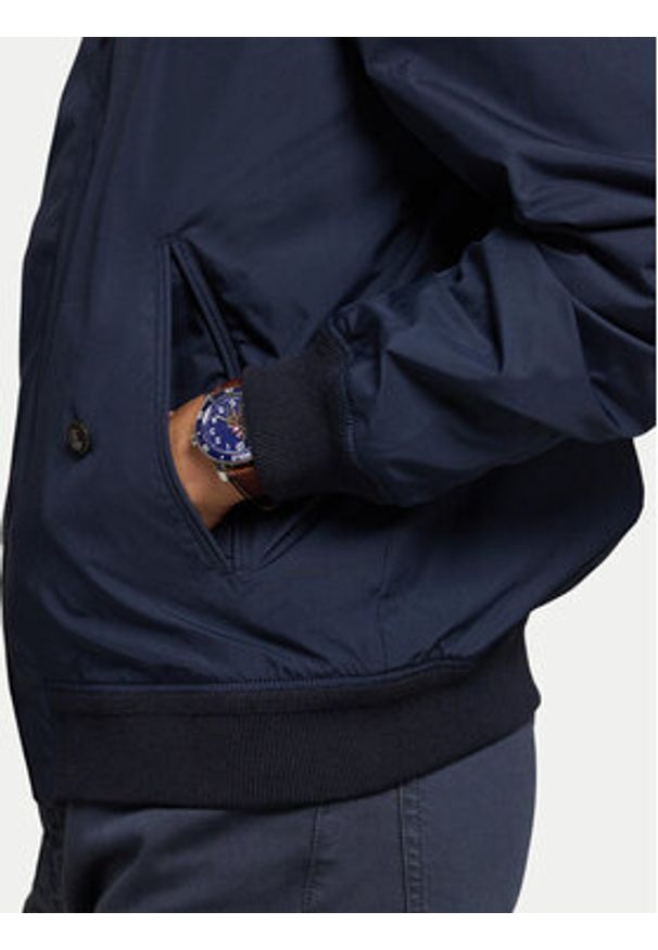 Polo Ralph Lauren Kurtka przejściowa 710970434001 Granatowy Regular Fit. Typ kołnierza: polo. Kolor: niebieski. Materiał: syntetyk