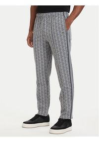 Lacoste Spodnie dresowe Paris Monogram XH1440 Szary Regular Fit. Kolor: szary. Materiał: bawełna #1