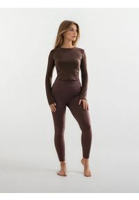 Sinsay - Legginsy sportowe Gym Hard - brązowy. Kolor: brązowy. Styl: sportowy #1