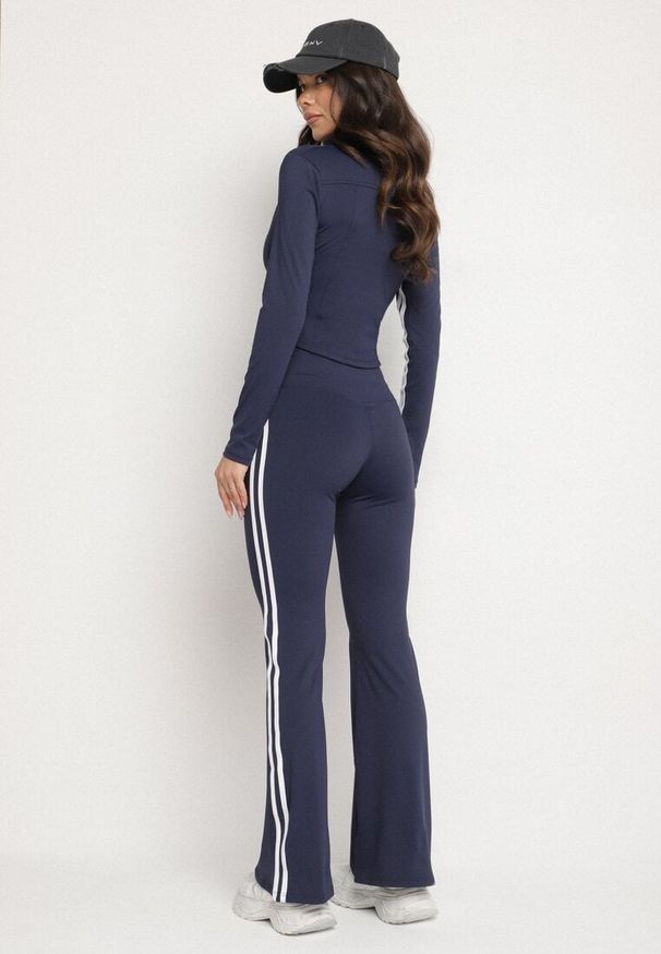 Born2be - Granatowy Komplet Sportowy Rozpinana Bluza i Spodnie Typu Dzwony Lumoreina. Kolor: niebieski. Wzór: aplikacja