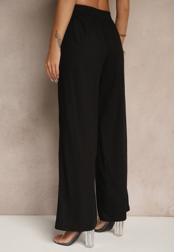 Renee - Czarne Spodnie z Lnem o Szerokim Kroju z Gumką w Talii Filarive. Okazja: na co dzień. Kolor: czarny. Materiał: len. Sezon: lato, wiosna. Styl: elegancki, casual