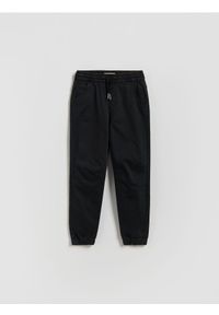 Reserved - Wysokoelastyczne spodnie jogger - czarny. Kolor: czarny. Materiał: bawełna, tkanina
