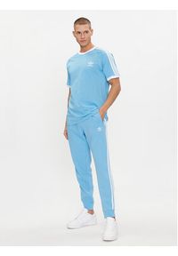 Adidas - adidas Spodnie dresowe adicolor 3-Stripes IM9451 Niebieski Slim Fit. Kolor: niebieski. Materiał: bawełna #5