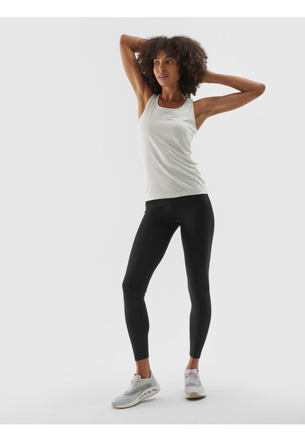 4f - 4F Legginsy treningowe ze średnim stanem damskie - czarne XS. Kolor: czarny. Materiał: elastan, materiał, włókno, dzianina, syntetyk. Wzór: ze splotem, gładki, jednolity. Sport: fitness