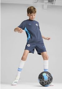 Puma - Młodzieżowe szorty treningowe Manchester City PUMA Inky Blue Magic. Kolor: niebieski