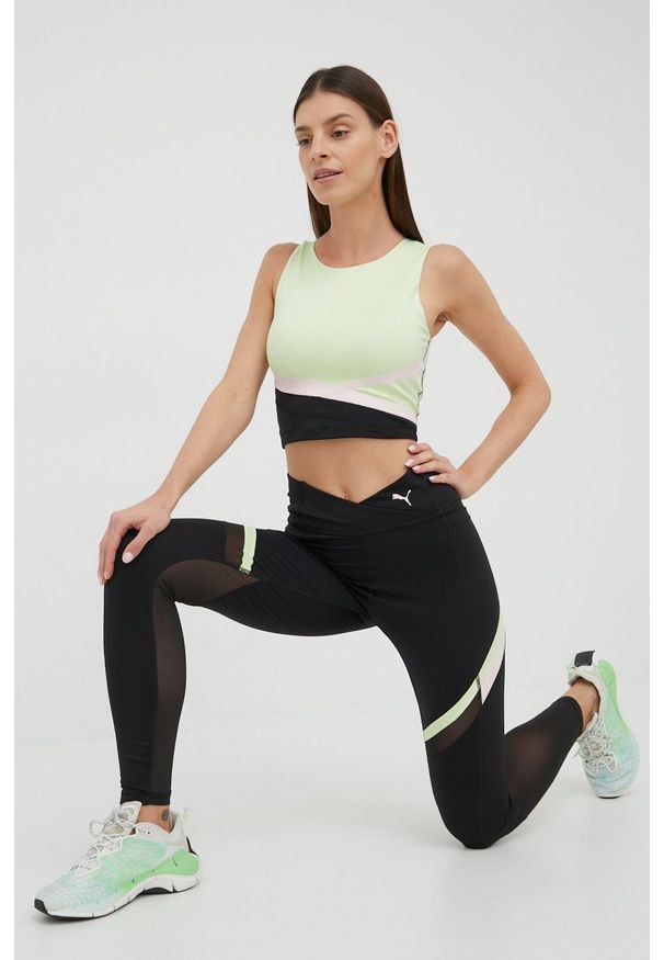 Puma legginsy treningowe 521579 damskie kolor czarny wzorzyste. Kolor: czarny. Materiał: skóra, materiał. Sport: fitness
