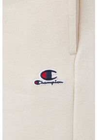 Champion spodnie dresowe 114925 damskie kolor beżowy gładkie. Kolor: beżowy. Materiał: dresówka. Wzór: gładki #3