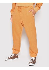 Vans Spodnie dresowe ComfyCush Wash VN0A7YCE Pomarańczowy Relaxed Fit. Kolor: pomarańczowy. Materiał: dresówka, bawełna