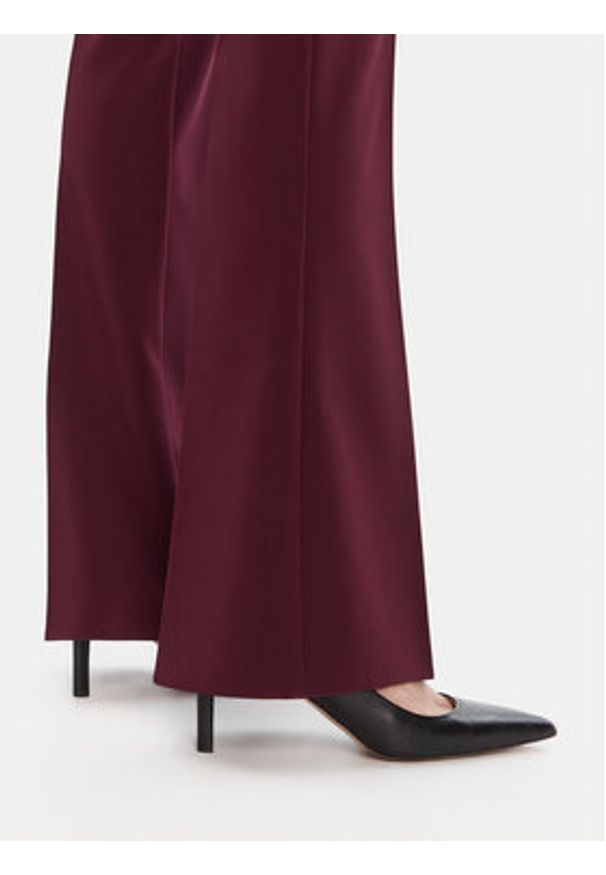 Rinascimento Spodnie materiałowe CFC0125318003 Bordowy Flare Fit. Kolor: czerwony. Materiał: syntetyk