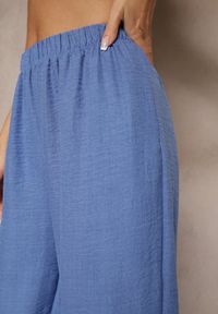 Renee - Niebieskie Spodnie Joggery High Waist ze Ściągaczami Korilanea. Okazja: na co dzień. Stan: podwyższony. Kolor: niebieski. Styl: casual, elegancki