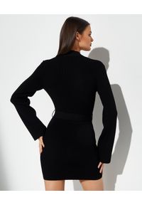 GAUGE81 AMSTERDAM - Czarna sukienka mini Baha. Kolor: czarny. Materiał: dzianina, prążkowany. Długość rękawa: długi rękaw. Typ sukienki: dopasowane. Długość: mini #5
