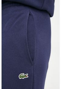 Lacoste spodnie dresowe męskie kolor granatowy gładkie XH9624-132. Kolor: niebieski. Materiał: dresówka. Wzór: gładki #4