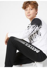 bonprix - Spodnie dresowe z miękkiej mieszanki bawełny. Kolor: czarny. Materiał: bawełna, dresówka, materiał #2