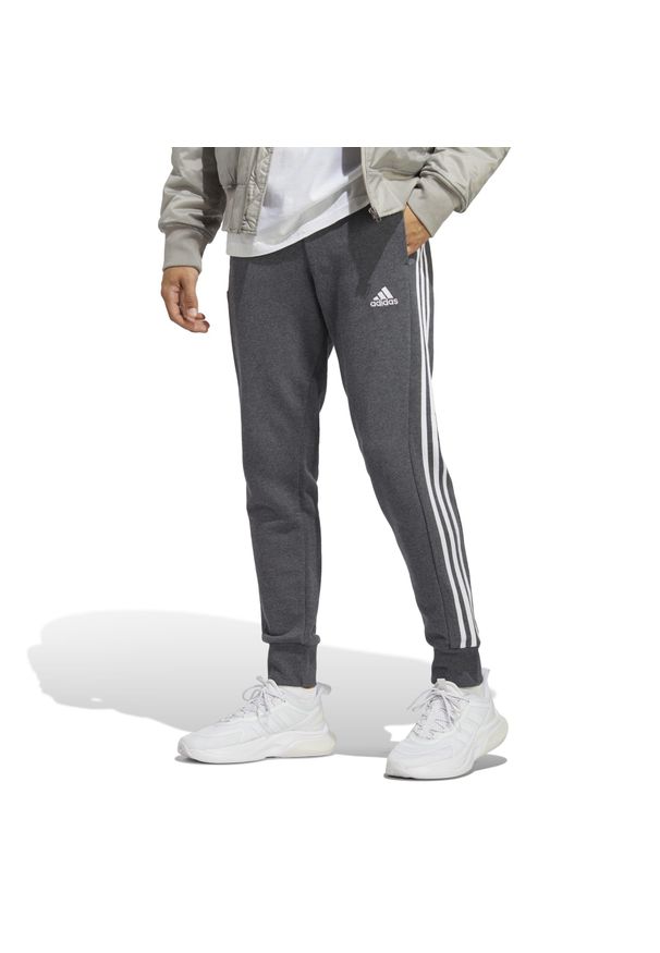 Adidas - Spodnie męskie adidas Essentials French Terry Tapered Cuff 3-Stripes. Kolor: szary, wielokolorowy, biały. Sport: fitness