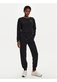 Fila Spodnie dresowe Buetzow FAW0701 Czarny Regular Fit. Kolor: czarny. Materiał: bawełna #4
