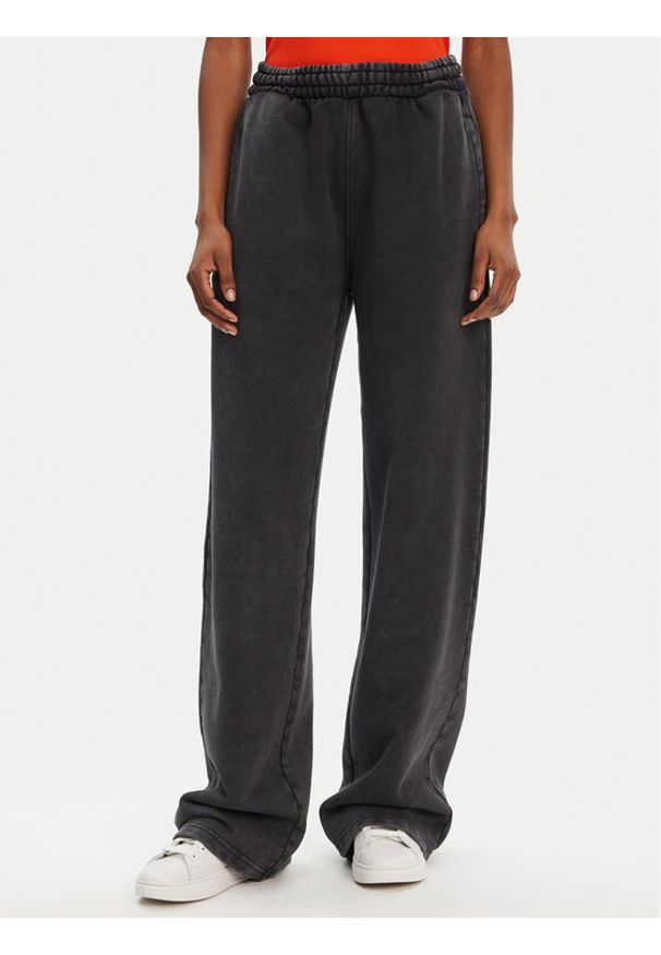 Hugo - HUGO Spodnie dresowe Nolasa_B 50545019 Czarny Loose Fit. Kolor: czarny. Materiał: bawełna