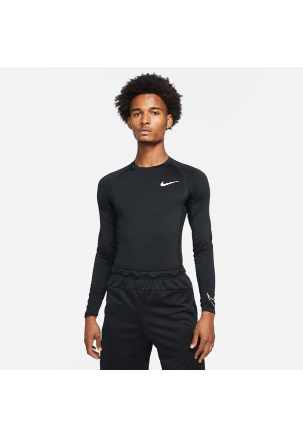 Koszulka treningowa męska Nike Compression. Kolor: czarny, biały, wielokolorowy. Długość rękawa: długi rękaw. Długość: długie. Sport: fitness