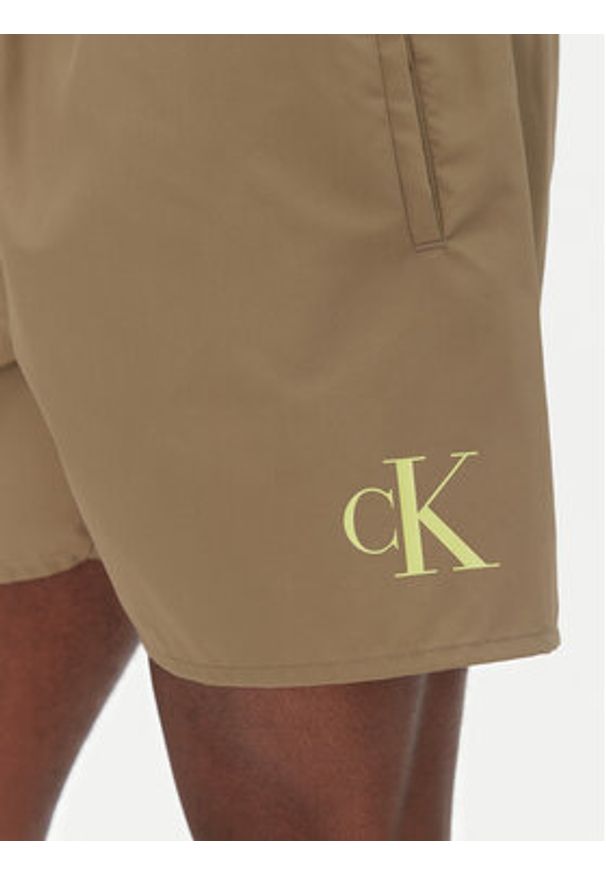 Calvin Klein Swimwear Szorty kąpielowe KM0KM01101 Khaki Regular Fit. Kolor: brązowy. Materiał: syntetyk