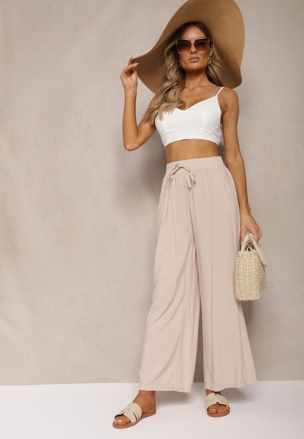 Renee - Beżowe Bawełniane Szerokie Spodnie Kuloty High Waist z Gumką w Talii Evitaes. Okazja: na co dzień, na spotkanie biznesowe. Stan: podwyższony. Kolor: beżowy. Materiał: bawełna. Styl: elegancki, biznesowy, casual