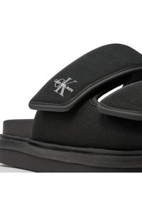 Calvin Klein Jeans Klapki Double Bar Sandal Mtl YM0YM01020 Czarny. Kolor: czarny. Materiał: materiał
