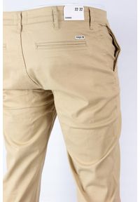 Wrangler - WRANGLER CHINO MĘSKIE SPODNIE MATERIAŁOWE SAND BEIGE W12CW358N 112126259. Materiał: materiał #5