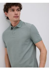 Reserved - Koszulka polo slim - jasny zielony. Typ kołnierza: polo. Kolor: zielony. Materiał: dzianina, bawełna #1