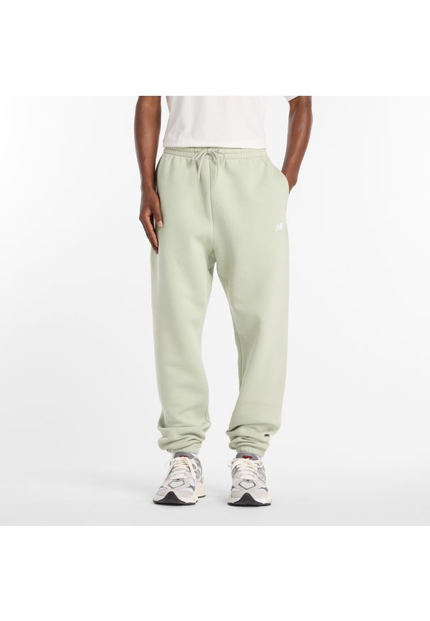 Spodnie męskie New Balance MP41503GAS – miętowe. Kolor: miętowy. Materiał: bawełna, dresówka, materiał, poliester