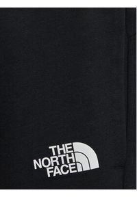 The North Face Spodnie dresowe Slacker NF0A82DS Czarny Regular Fit. Kolor: czarny. Materiał: bawełna