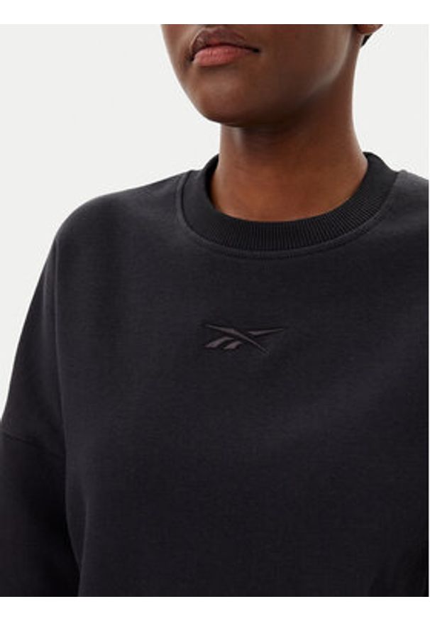 Reebok Bluza 100075359 139-18-00 Czarny Oversize. Kolor: czarny. Materiał: bawełna