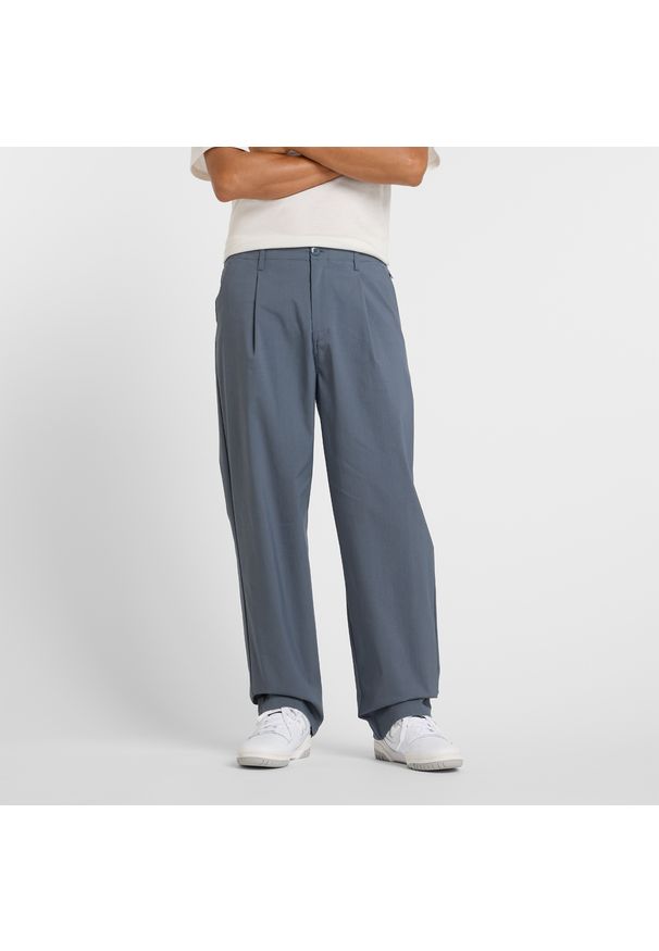 Spodnie męskie New Balance MP51563GT – szare. Kolor: szary. Materiał: bawełna, materiał, nylon
