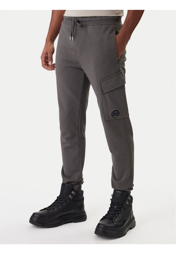 C.P. Company Spodnie dresowe 20CMSP067A110044R Szary Slim Fit. Kolor: szary. Materiał: bawełna