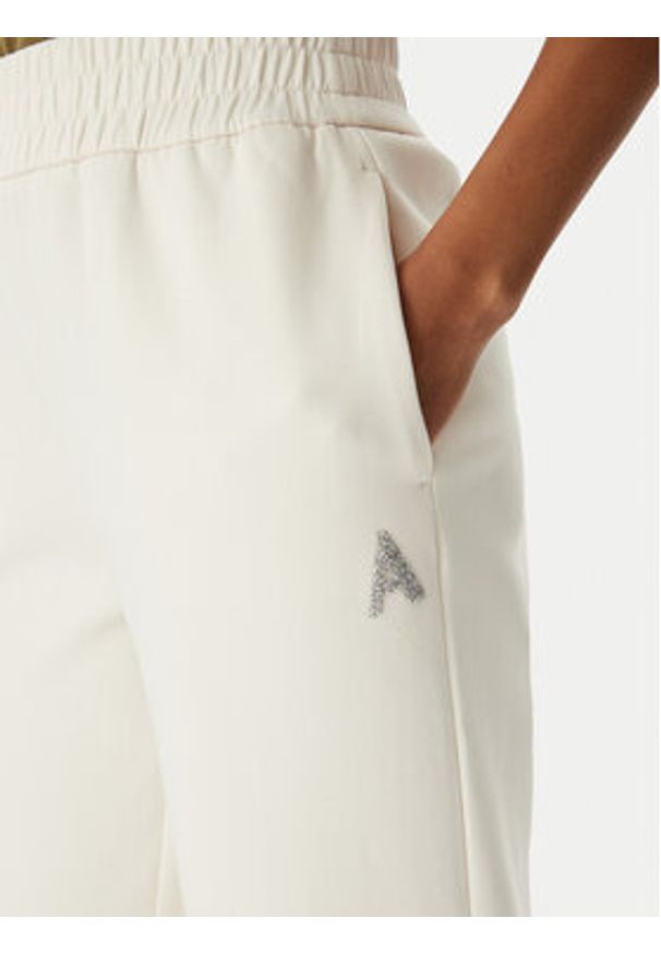 Armani Exchange Spodnie dresowe XW002840 AF21298 U1003 Kremowy Regular Fit. Kolor: kremowy. Materiał: bawełna