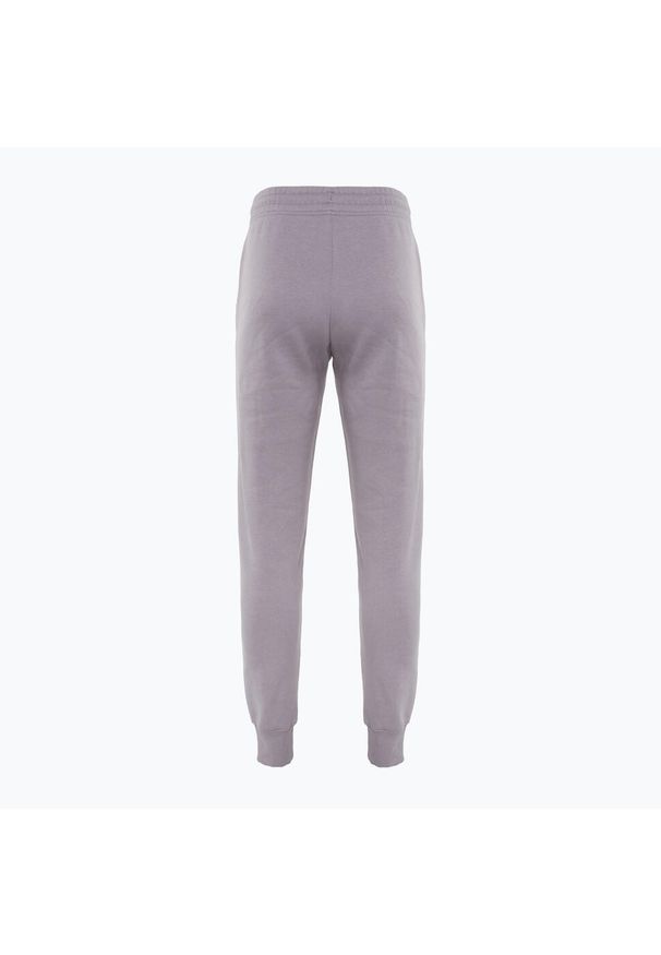 Spodnie damskie Nike Phoenix Fleece. Kolor: fioletowy