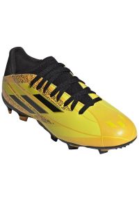 Adidas - Buty piłkarskie adidas X Speedflow Messi.3 Fg Jr GW7420 żółte żółcie. Kolor: żółty. Materiał: syntetyk. Szerokość cholewki: normalna. Sport: piłka nożna